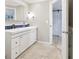 Bathroom features double sinks, tile floors and modern lighting at 9630 W 38Th Ave, Wheat Ridge, CO 80033