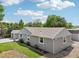 Charming home featuring clean lines, complemented by lush landscaping and a well-maintained lawn at 9630 W 38Th Ave, Wheat Ridge, CO 80033