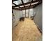 Interior view of the building with wood shavings, feeder and watering system at 9630 W 38Th Ave, Wheat Ridge, CO 80033