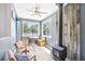 Inviting living space featuring wood accents, a cozy wood-burning stove, and comfortable seating, perfect for relaxation at 9630 W 38Th Ave, Wheat Ridge, CO 80033