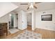 Open bedroom featuring hardwood floors and two closets with ample storage space at 12212 W 60Th Pl, Arvada, CO 80004