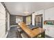 Modern kitchen with stainless steel appliances, custom cabinetry, and a spacious island with a cooktop at 12212 W 60Th Pl, Arvada, CO 80004