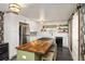 A contemporary kitchen boasts a wood countertop island and stainless steel appliances at 12212 W 60Th Pl, Arvada, CO 80004