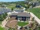 Aerial view of a luxury home with a backyard, nestled in a scenic neighborhood at 372 Castlemaine Ct, Castle Rock, CO 80104