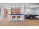 View of the basement featuring a wet bar with pendant lights and a billiard table at 372 Castlemaine Ct, Castle Rock, CO 80104