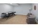 Spacious finished basement with comfortable seating and an air hockey table at 372 Castlemaine Ct, Castle Rock, CO 80104