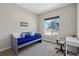 Cozy bedroom with natural light, plush carpeting, and a comfortable daybed at 372 Castlemaine Ct, Castle Rock, CO 80104