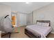 Stylish bedroom with a hanging chair and a cozy nook with a view at 372 Castlemaine Ct, Castle Rock, CO 80104
