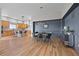 Open floor plan featuring a modern dining area adjacent to a kitchen with a large island at 372 Castlemaine Ct, Castle Rock, CO 80104