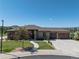 Beautiful single-story home featuring stone accents, a landscaped yard, and a two-car garage on a sunny day at 372 Castlemaine Ct, Castle Rock, CO 80104