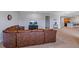 Living room featuring a leather sectional sofa and an open floor plan at 372 Castlemaine Ct, Castle Rock, CO 80104