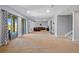 Spacious living room with sliding glass doors and comfortable seating area at 372 Castlemaine Ct, Castle Rock, CO 80104