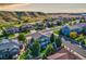 Breathtaking aerial view of a suburban neighborhood, with rolling hills at 3779 Aspen Hollow Ct, Castle Rock, CO 80104