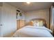 Comfortable bedroom with a dresser and soft, neutral colors at 3779 Aspen Hollow Ct, Castle Rock, CO 80104
