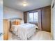 Cozy bedroom with a queen size bed, soft carpet, and window with natural light at 3779 Aspen Hollow Ct, Castle Rock, CO 80104
