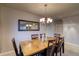 Elegant dining room featuring a classic wooden table and decorative chandelier, perfect for Gathering gatherings at 3779 Aspen Hollow Ct, Castle Rock, CO 80104
