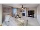 Inviting living room with a fireplace, plush sofa, and neutral color palette at 3779 Aspen Hollow Ct, Castle Rock, CO 80104