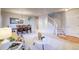 Open-concept living space with stairs, neutral tones, hardwood and carpeted floors at 3779 Aspen Hollow Ct, Castle Rock, CO 80104
