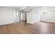 Finished basement featuring wood floors, bright lighting, and a large closet at 1330 Quebec St, Denver, CO 80220