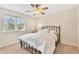 Bedroom featuring natural light and a ceiling fan at 18940 Pebble Beach Way, Monument, CO 80132