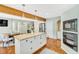 Spacious kitchen with center island, stainless appliances, and eat-in breakfast nook at 18940 Pebble Beach Way, Monument, CO 80132