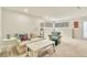 Living room featuring a seating area and ample natural light from the windows at 18940 Pebble Beach Way, Monument, CO 80132