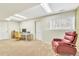 Bright office space with carpet, window, natural light and comfortable seating at 18940 Pebble Beach Way, Monument, CO 80132