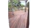 Stained wood deck with white railings, offering a relaxing outdoor space at 13126 W Warren Cir, Lakewood, CO 80228