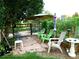 Patio area with garden beds at 13126 W Warren Cir, Lakewood, CO 80228