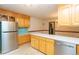 Spacious kitchen with stainless steel appliances and tile backsplash at 29055 S Sunset Trl, Conifer, CO 80433