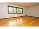 Spacious living room features a window with plenty of light at 29055 S Sunset Trl, Conifer, CO 80433