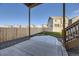 Backyard patio area with newly laid patio and lush lawn at 926 W Beverly St, Elizabeth, CO 80107