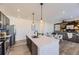 Open-concept living area with modern furnishings and stylish design details at 926 W Beverly St, Elizabeth, CO 80107