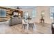 Bright living room featuring modern furniture, stylish decor, and wood-look flooring at 926 W Beverly St, Elizabeth, CO 80107