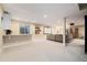 Spacious basement with carpet, a bar, a projector, and a movie screen at 17452 W 83Rd Pl, Arvada, CO 80007