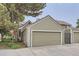 Attached two-car garage providing convenient parking and storage space with an adjacent gated area at 2299 Ranch Dr, Westminster, CO 80234