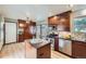 Open kitchen with an island, stainless steel appliances, and ample cabinet space at 2299 Ranch Dr, Westminster, CO 80234