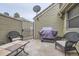 This view shows the patio that features stone pavers, outdoor seating, and a grill at 2299 Ranch Dr, Westminster, CO 80234