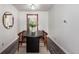 Chic dining room featuring modern table, stylish chairs, and minimalist decor at 7484 E Princeton Ave, Denver, CO 80237