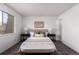 Cozy main bedroom featuring carpet floors, decorative rug, and neutral decor at 7484 E Princeton Ave, Denver, CO 80237