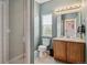 Tidy bathroom with shower, tile flooring, and single sink vanity at 26155 E Euclid Dr, Aurora, CO 80016
