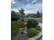 Beautifully landscaped with rock and colorful plants adding curb appeal to this suburban home at 26155 E Euclid Dr, Aurora, CO 80016