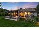 Charming backyard patio featuring a cozy fire pit and comfortable seating, perfect for entertaining at 1 Club Ln, Littleton, CO 80123