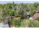 Aerial view of the backyard, showing the trees and landscaping of the yard at 5355 S Windermere St, Littleton, CO 80120