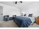 Neutral bedroom featuring a ceiling fan, plush textiles and velvet chairs at 9877 Arthur Ln, Highlands Ranch, CO 80130