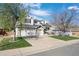 Lovely two-story home with a three-car garage and lush landscaping, offering a perfect blend of comfort and style at 9877 Arthur Ln, Highlands Ranch, CO 80130