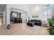 Inviting living room with bar, comfortable seating, and natural light, perfect for relaxing and entertaining guests at 9877 Arthur Ln, Highlands Ranch, CO 80130