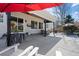 Spacious patio area offering multiple seating options and backyard views, perfect for outdoor gatherings at 9877 Arthur Ln, Highlands Ranch, CO 80130