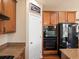 Modern kitchen features granite countertops, stainless steel appliances, and ample cabinet space at 2853 Black Canyon Way, Castle Rock, CO 80109
