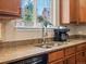 Kitchen featuring stainless steel appliances, a double sink, and granite countertops at 2853 Black Canyon Way, Castle Rock, CO 80109